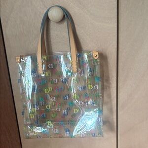 Dooney & Bourke Clear Tote with Multicolor DB Logos and Tan Handles
